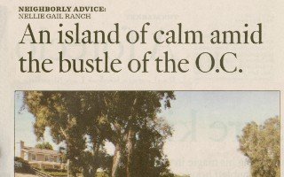 Newspaper article “An island of calm amid the bustle of the O.C.” with a photograph of a tree-lined property.