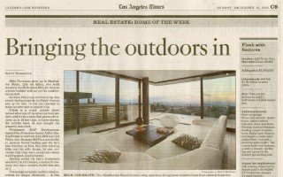Newspaper article “Bringing the outdoors in” with a photograph of a home’s open living area.