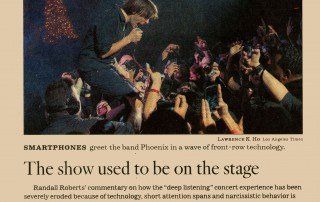 Los Angeles Times article “The show used to be on the stage” with a live concert photograph.