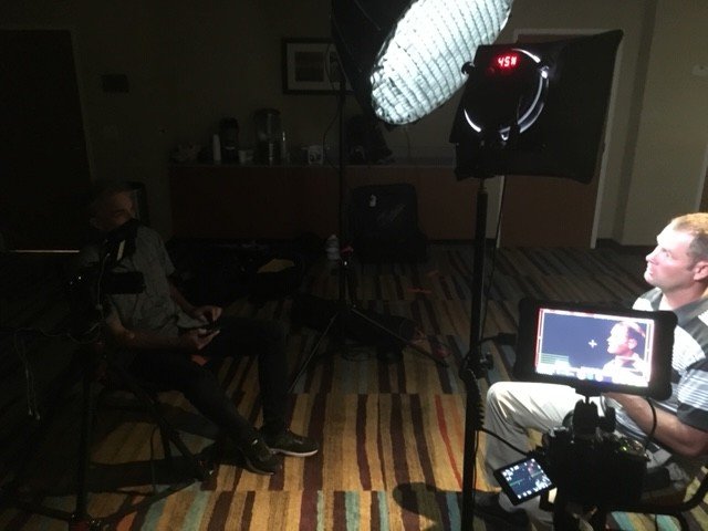 Marshootz Productions – Interview Camera Setup Cameras and studio lighting arranged for a seated interview.